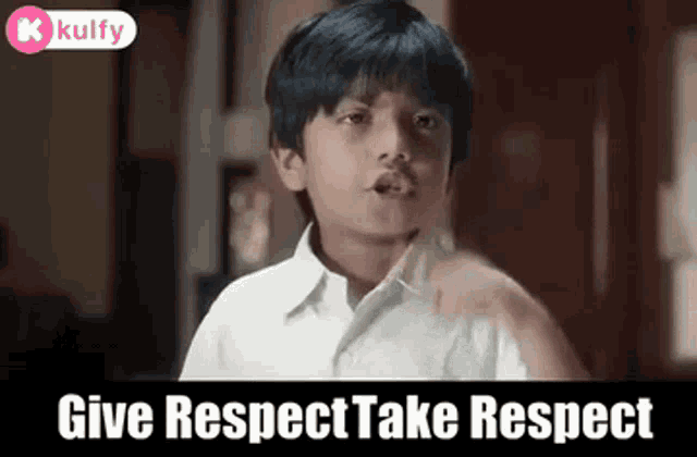 a young boy in a white shirt is giving a speech .