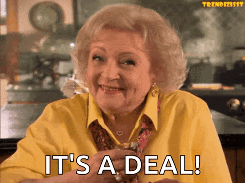 a woman in a yellow shirt says it 's a deal while holding a glass of wine