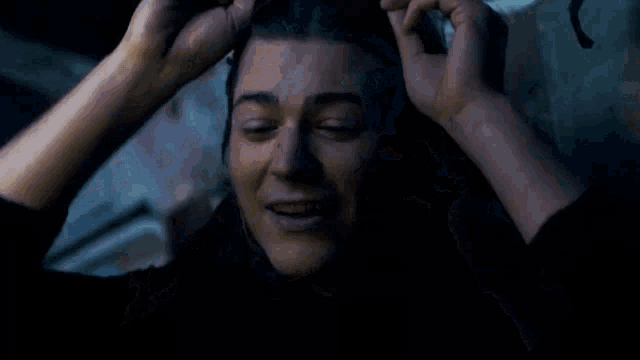a close up of a person 's face with a lot of sticky liquid on it