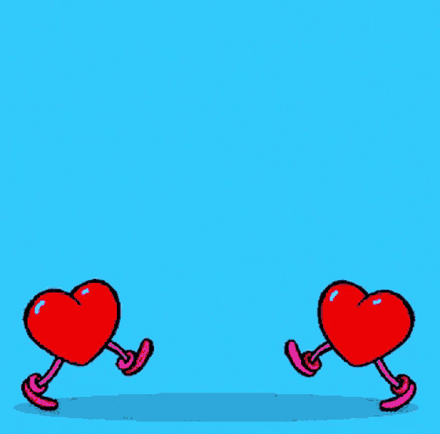 a red heart is floating in the air against a blue background