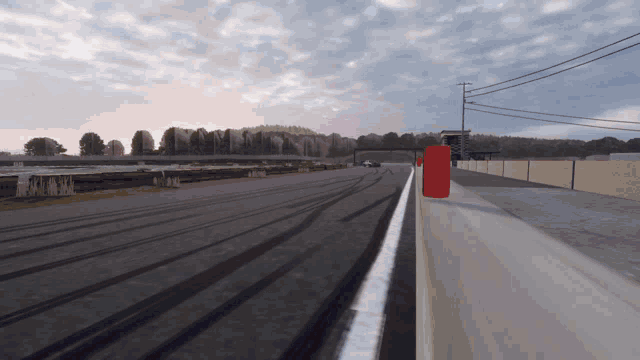 a red object is on the side of the road