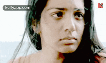 a close up of a woman 's face with the words kulfyapp.com in the corner .