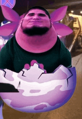 a man with a beard is holding a pink egg with a flower on his head .