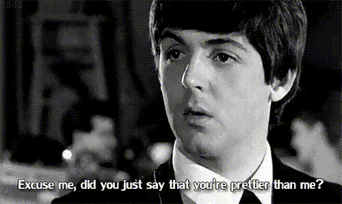 a black and white photo of paul mccartney with the caption excuse me did you just say that you 're prettier than me