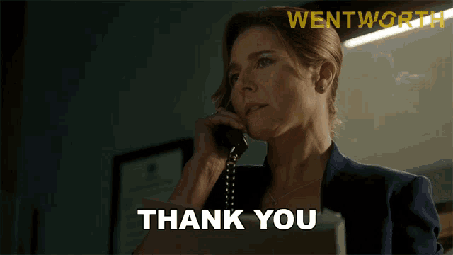 a woman is talking on a phone and the words thank you are above her