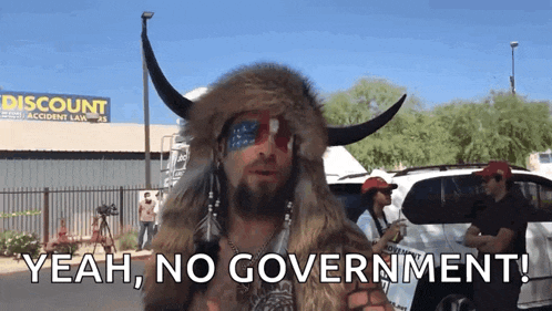 a man in a buffalo costume is standing in front of a discount store