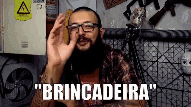 a man wearing glasses says brincadeira in a foreign language