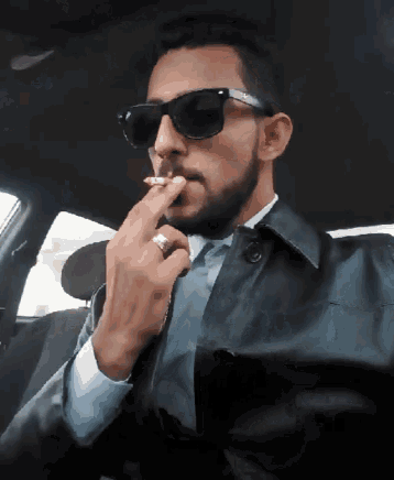 Smoking Cigar GIF - Smoking Cigar Sass GIFs