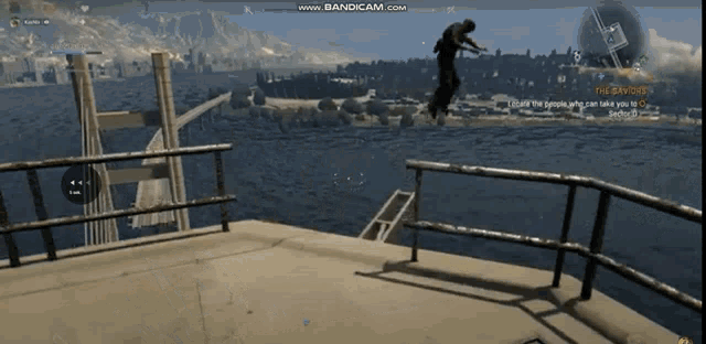 a video game screen shows a man jumping into the water with the words " the savior " visible