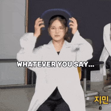 a woman in a lab coat says whatever you say in a foreign language
