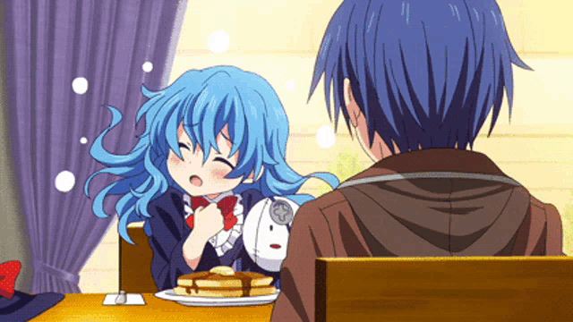 a boy and a girl are sitting at a table with a plate of pancakes
