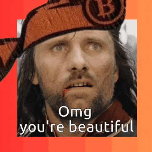 a man with a beard wearing a hat with the letter b on it