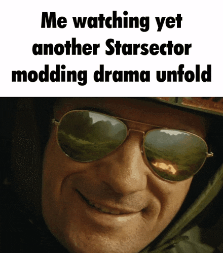 a man wearing sunglasses is smiling with the caption " me watching yet another starsector modding drama unfold "