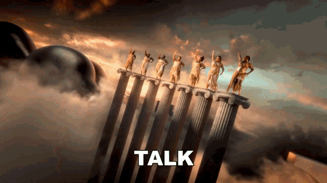 a group of statues standing on top of columns with the word talk written below them