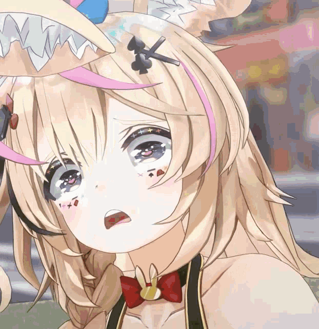 a close up of a blonde anime girl with a bunny ear
