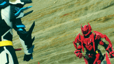 a red robot with a sword is standing next to a white robot