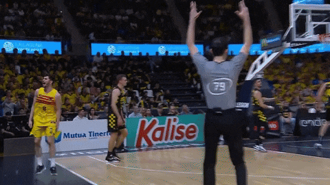 a referee with the number 79 on the back of his shirt