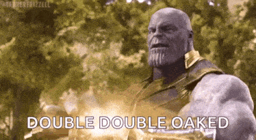 thanos from avengers : infinity war is holding a sword and a shield in his hands .