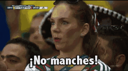 a woman in a crowd says no manches in spanish