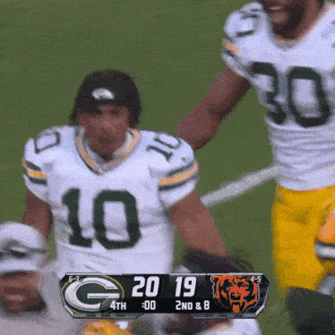 the green bay packers are playing the bears and the score is 20-19
