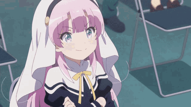a girl with pink hair is wearing a white veil and smiling
