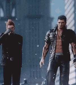 two men are standing next to each other on a street in a video game .