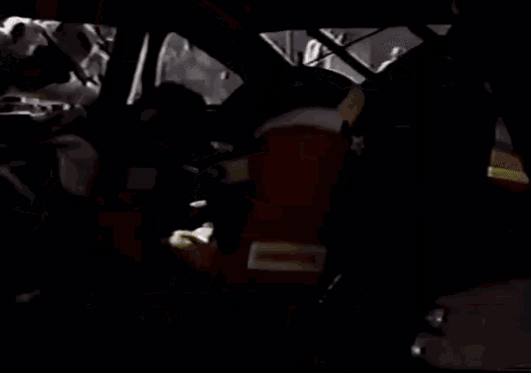 a man in a car with the name davey allison written on the screen