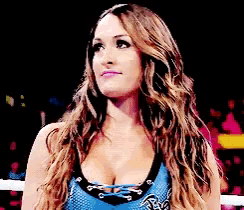 a pixelated image of a woman in a wrestling ring with a huge breast