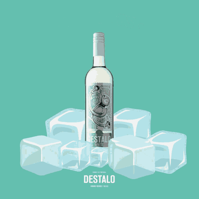 a bottle of destalo white wine sits on ice cubes