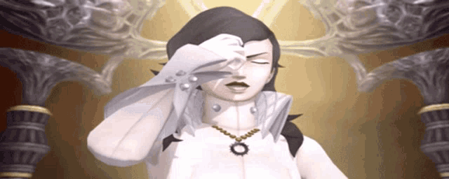 a statue of a woman with her eyes closed and her hand on her face