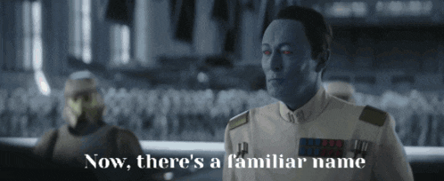 a man in a white uniform with red eyes says now there 's a familiar name