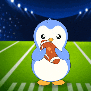 a blue and white penguin holding a football on a football field