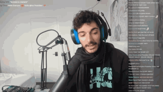 a man wearing headphones stands in front of a microphone with the words alpha 101 " business channel " on the bottom