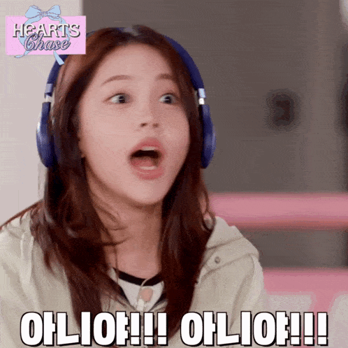 a girl wearing headphones with hearts chase written in the background