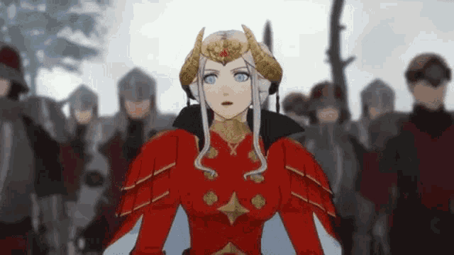 a woman in a red dress is standing in front of a group of soldiers in armor .