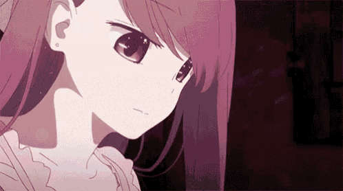 a close up of a pink haired anime girl with a sad look on her face .