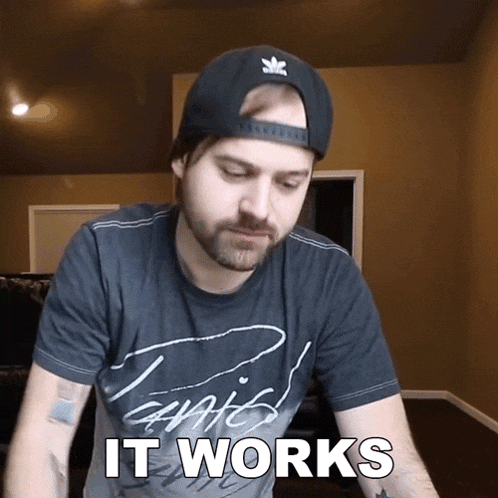 a man wearing a t-shirt that says it works