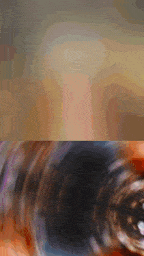 a blurred image of a person 's face and a circle in the middle
