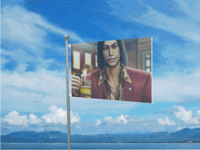 a flag with a picture of a man on it flying in the wind