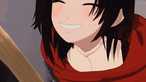 a girl with a red scarf around her neck smiles with her eyes closed