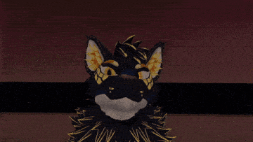 a close up of a furry animal 's face with yellow feathers on it 's ears