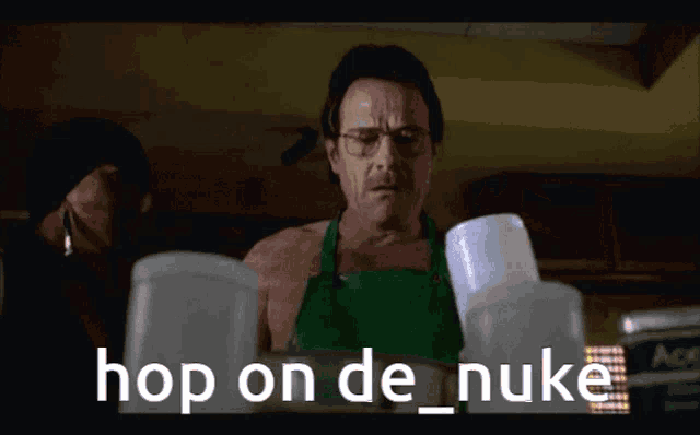 a man in an apron is standing in a kitchen with the words hop on de nuke