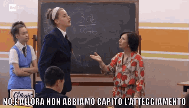 a group of people standing in front of a blackboard with the word collegio on it