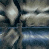 a close up of a person 's face with a blurred background of a painting .