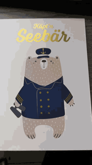 a picture of a bear in a captain 's uniform with the word seebar on the top
