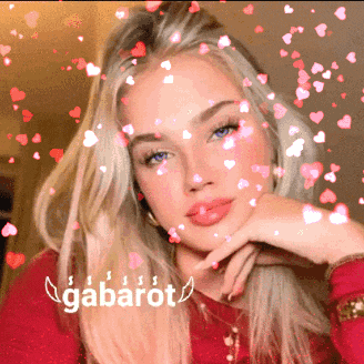 a woman is surrounded by hearts and the word gabarot
