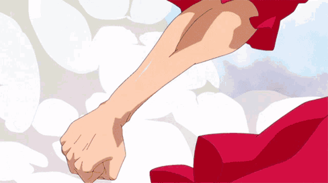 a close up of a person 's arm with a fist in it