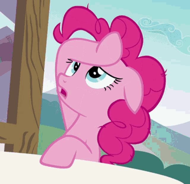 a pink pony with a surprised expression on her face