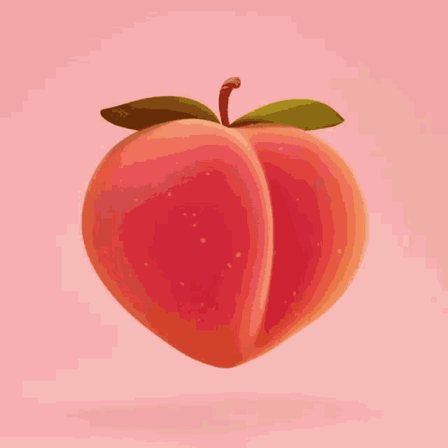 a peach with a green leaf on top of it