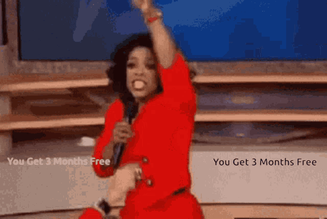 a woman in a red dress is holding a microphone with the words " you get 3 months free " above her
